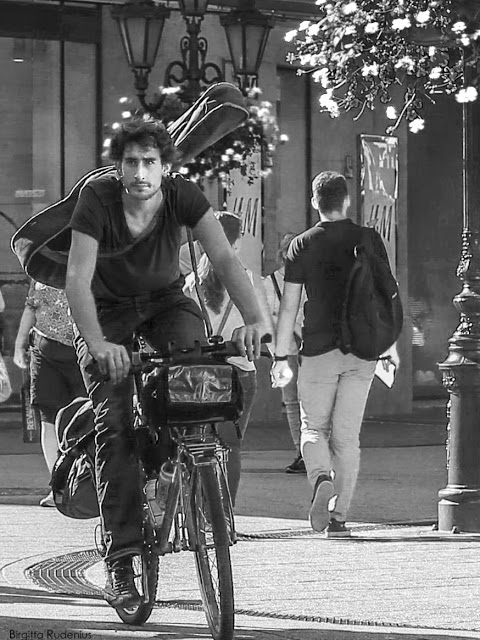 Street Photography - The musician on bike